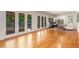 Open floor plan featuring hardwood floors, French doors to the outside, and ample natural light at 186 Mt Calvary Rd, Marietta, GA 30064