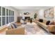 Bright living room features a fireplace, shutters, hardwood floors, and stylish decor at 186 Mt Calvary Rd, Marietta, GA 30064