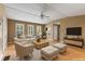 Bright living room boasts hardwood floors, neutral colors, and ample natural light through shuttered windows at 186 Mt Calvary Rd, Marietta, GA 30064