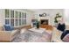 Living room showcases a fireplace, hardwood floors, a rug and lots of natural light at 186 Mt Calvary Rd, Marietta, GA 30064