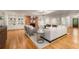 Spacious living area with hardwood floors, a brick fireplace, and stylish furnishings at 186 Mt Calvary Rd, Marietta, GA 30064