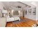 Light-filled main bedroom features hardwood floors, a fireplace and built-in bookshelves at 186 Mt Calvary Rd, Marietta, GA 30064