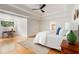 Bright main bedroom features hardwood floors, tray ceilings and attached sitting room with desk at 186 Mt Calvary Rd, Marietta, GA 30064