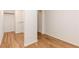 Spacious walk-in closet featuring hardwood floors and ample hanging space for organized storage at 186 Mt Calvary Rd, Marietta, GA 30064