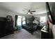 Relaxing bedroom with soft carpet floors, ample natural light, and a unique design style at 359 Dallas St, Hiram, GA 30141