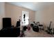 Empty bedroom is set up as music room with drumset and guitars at 359 Dallas St, Hiram, GA 30141