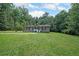 Charming one-story home with a well-manicured lawn and beautiful landscaping, perfect for outdoor relaxation at 359 Dallas St, Hiram, GA 30141