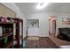 Functional laundry area with appliances, storage shelves, and easy access from the living area at 359 Dallas St, Hiram, GA 30141