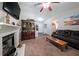 Open living room features a fireplace, comfortable seating, and a neutral color scheme, perfect for gatherings at 359 Dallas St, Hiram, GA 30141
