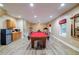 Finished basement with plank flooring, a pool table, a mini fridge, and exercise equipment at 3623 Terrah Point Dr, Duluth, GA 30097