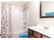 Bathroom with a shower-tub combination and a seashell-themed shower curtain at 3623 Terrah Point Dr, Duluth, GA 30097