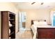 Bedroom featuring carpet, ceiling fan, and shelf with decorative teddy bear at 3623 Terrah Point Dr, Duluth, GA 30097