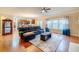 Open-concept living room features hardwood floors, natural light, and access to a modern kitchen at 3623 Terrah Point Dr, Duluth, GA 30097
