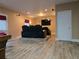 Home theater room with platform seating, large screen, and modern entertainment setup at 3623 Terrah Point Dr, Duluth, GA 30097