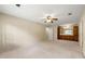 Spacious bedroom featuring neutral tones, a ceiling fan, and an ensuite bathroom with a double vanity at 6553 Parkside Way, Tucker, GA 30084