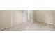 Neutral bedroom featuring plush carpeting and a view to the open corridor at 6553 Parkside Way, Tucker, GA 30084