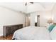 Spacious main bedroom with a tray ceiling and entry to ensuite bath at 6890 Autumn Hills Dr, Cumming, GA 30028