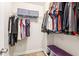 Spacious walk-in closet with ample hanging and shelving space at 6890 Autumn Hills Dr, Cumming, GA 30028