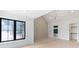 Bedroom featuring vaulted ceiling, chandelier, walk-in closet, and ensuite bathroom at 130 Nova Ln, Roswell, GA 30075