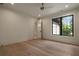 Bright, airy bedroom with large windows and hardwood floors at 130 Nova Ln, Roswell, GA 30075