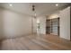 Bedroom featuring a ceiling fan, hardwood floors, and closet with shelving at 130 Nova Ln, Roswell, GA 30075