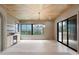 Dining room featuring a decorative wood ceiling, a wine fridge, and access to the patio at 130 Nova Ln, Roswell, GA 30075