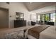 Spacious main bedroom features a vaulted ceiling, a sitting area, and an elegant dark wood dresser at 130 Nova Ln, Roswell, GA 30075
