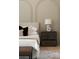 Close-up of the main bedroom featuring stylish décor and accent wall at 130 Nova Ln, Roswell, GA 30075