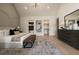Bright bedroom boasts vaulted ceilings, walk in closet, and a view of the ensuite bathroom at 130 Nova Ln, Roswell, GA 30075