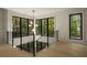 Stairwell featuring natural lighting and views of the outdoor landscape at 130 Nova Ln, Roswell, GA 30075