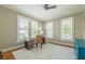 Comfortable bedroom with lots of natural light and lovely hardwood floors at 417 S Candler St, Decatur, GA 30030
