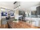 Open-concept kitchen and dining area, seamlessly flowing into a cozy living room with a fireplace at 417 S Candler St, Decatur, GA 30030