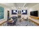 Inviting living room with a fireplace, custom built-ins, and stylish decor at 417 S Candler St, Decatur, GA 30030