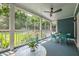Charming porch with seating and dining areas, perfect for enjoying the outdoors at 417 S Candler St, Decatur, GA 30030