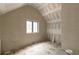 Bathroom with vaulted ceiling and a window, during the construction phase at 4608 Kings Down Rd, Atlanta, GA 30338