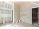 Bathroom showcasing tiled walls, and an open doorway, during the construction phase at 4608 Kings Down Rd, Atlanta, GA 30338