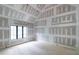 Bright bedroom showcasing vaulted ceilings and a window, during the construction phase at 4608 Kings Down Rd, Atlanta, GA 30338