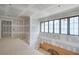 Upstairs hallway featuring large windows for natural light and views at 4608 Kings Down Rd, Atlanta, GA 30338