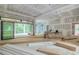 A spacious living room with large sliding glass doors leading to the outdoor space, offering seamless indoor-outdoor living at 4608 Kings Down Rd, Atlanta, GA 30338
