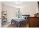 Bedroom with natural light and standard closet at 106 Logan Pass Dr, Loganville, GA 30052
