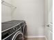 Laundry room with a new front-load washer and dryer set at 106 Logan Pass Dr, Loganville, GA 30052