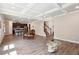 Spacious living area with an open layout, connecting the living room to the kitchen and dining spaces at 106 Logan Pass Dr, Loganville, GA 30052