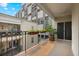 Outdoor balcony featuring potted plants and views of surrounding buildings at 175 15Th Ne St # 410, Atlanta, GA 30309