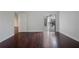 Empty bedroom with hardwood floors and view of balcony through sliding glass door at 175 15Th Ne St # 410, Atlanta, GA 30309