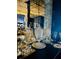 This bar area showcases mirrored wall tiles with decanters and glassware at 3180 Mathieson Drive # 502, Atlanta, GA 30305