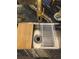 Close up of a stainless steel kitchen sink with cutting board and marble countertops at 3180 Mathieson Drive # 502, Atlanta, GA 30305