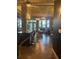 Open concept living room with exposed brick, modern lighting, and stylish furniture at 3180 Mathieson Drive # 502, Atlanta, GA 30305