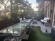 Inviting backyard patio includes dining set, landscaping, and ample space for entertaining at 3180 Mathieson Drive # 502, Atlanta, GA 30305