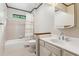 Cozy bathroom features a shower-tub combination and a vanity at 6165 Pin Oak Ln, Alpharetta, GA 30005