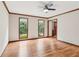 Bright living room featuring hardwood floors and a natural light at 6165 Pin Oak Ln, Alpharetta, GA 30005